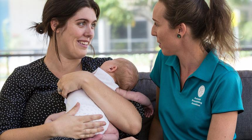 Counsellor with mother and baby