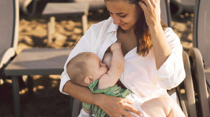 Mother and baby breastfeed