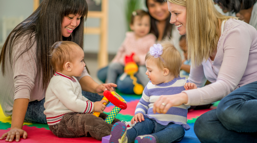 Two early childhood education and care educators