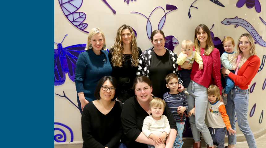 A group photo of Casey-Cardinia Group volunteers along with several children.