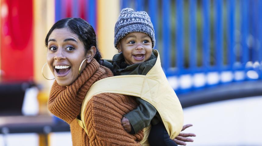 Mum at a playground with a baby