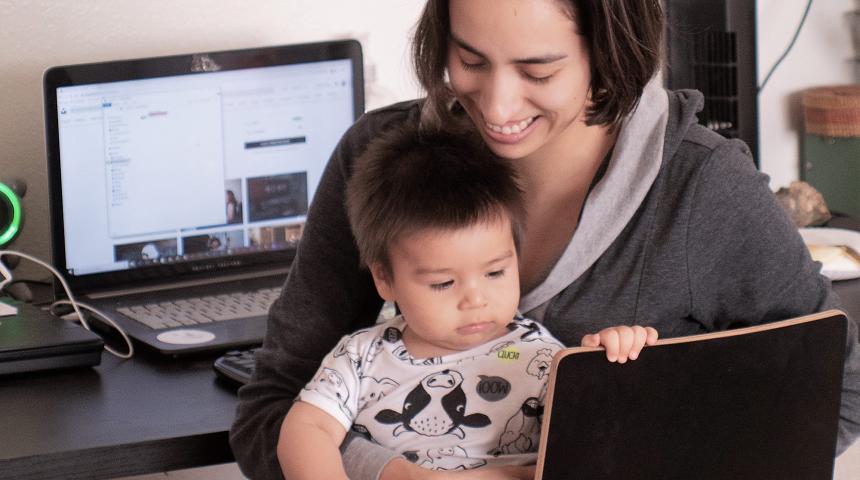 A group treasurer doing her volunteer work with her baby