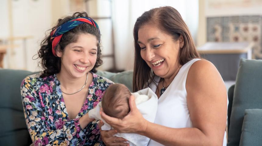 A woman, her baby and the baby's grandmother