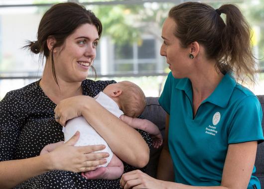 Counsellor with mother and baby