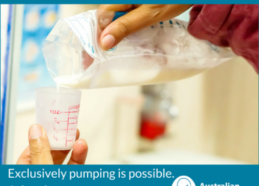Pouring expressed breastmilk into measuring cup