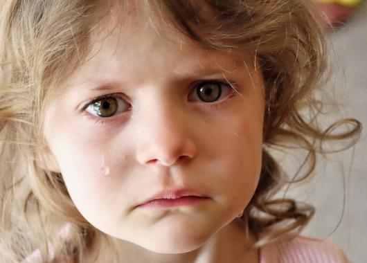 A young child cries