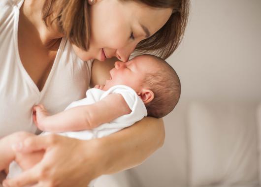 Mother holding her baby