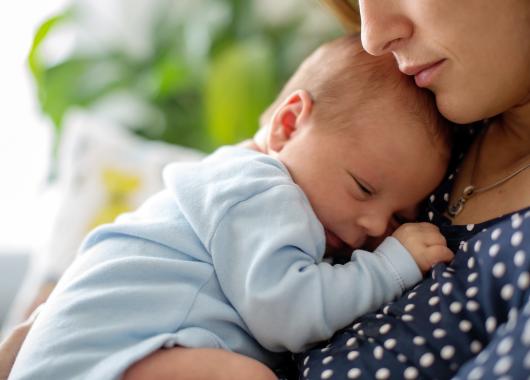 mum holding newborn