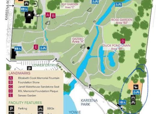 map showing water, grass, playgrounds, parking. 