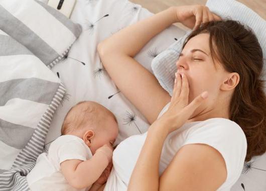 Mum and baby lying together