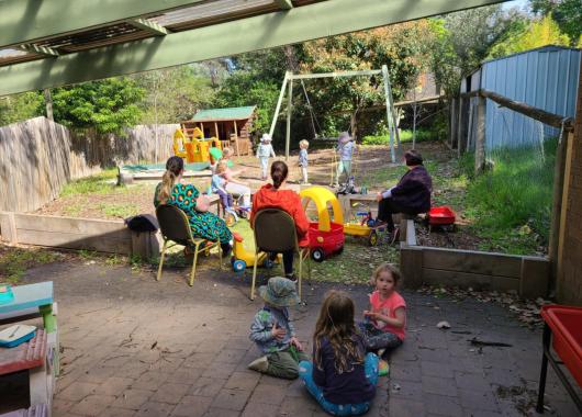 mums and kids playing outdoors