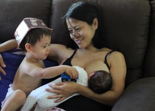 mother with toddler and baby