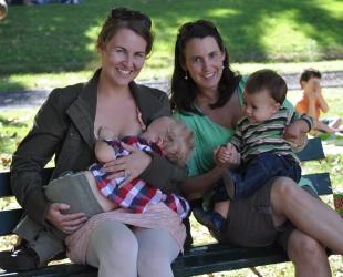 mums feeding on bench