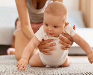 Baby playing on floor