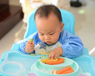 baby in  high chair