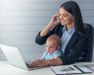 mum and baby at laptop