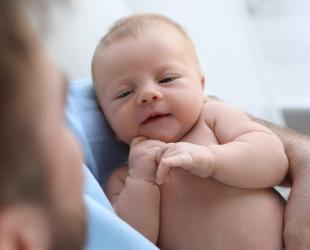 Father holding baby