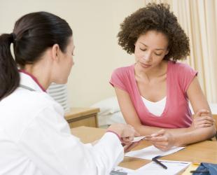 woman visiting doctor