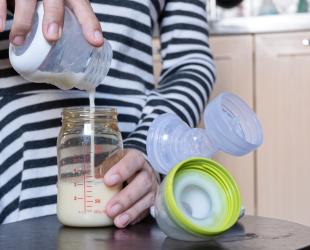 pouring breastmilk