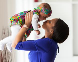 mum holding baby up