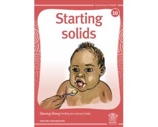 Aboriginal baby being fed solids