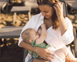 Mother and baby breastfeed