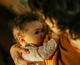A mother and baby breastfeeding