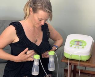 woman using a double breast pump