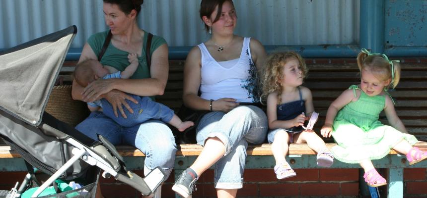 Mothers at bus stop