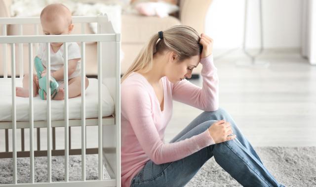 Mother sitting on floor