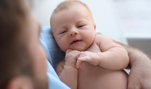 Father holding baby