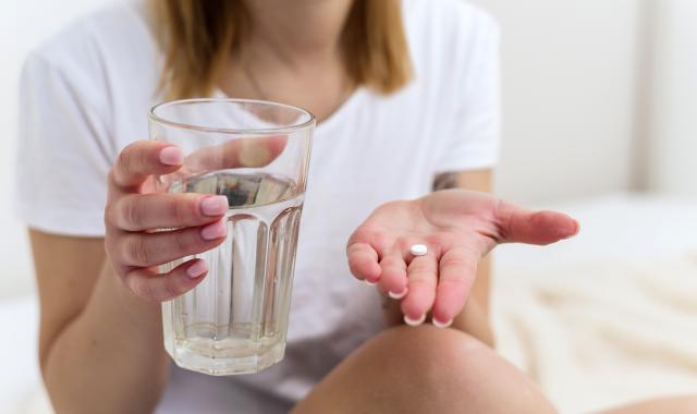 woman with pill