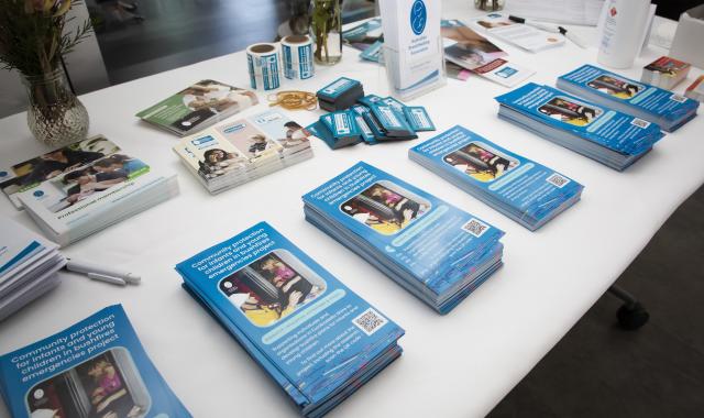 A range of printed resources from the bushfire project displayed at a local event