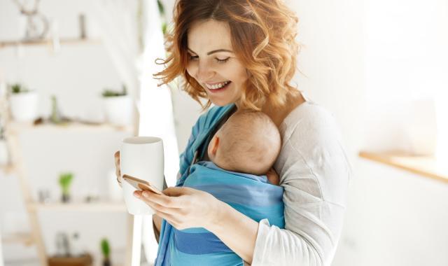 mum holding baby close