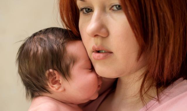 Mum holding baby
