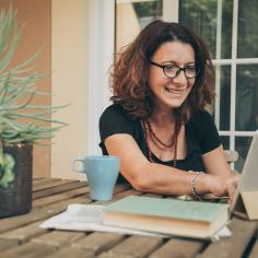A woman attends an online learning session